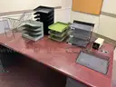 Metal Desk with Assorted Office Accessories and Wooden Cabinet