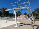 2 S.R. Smith Diving Boards Including Stands, Rails, Ladders, and All Equipment