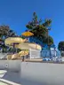 USA Slide 19&#x27; Tall Pool Slide with attached Staircase and Canopy and Surrounding Fence