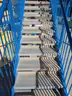 USA Slide 19&#x27; Tall Pool Slide with attached Staircase and Canopy and Surrounding Fence