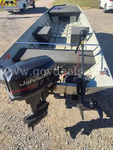 1994 16FT OMC ALUMINUM BOAT WITH 25HP JOHNSON OUTBOARD MOTOR AND TRAILER