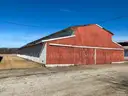 Six (6) Pole Barns - 100' x 55'