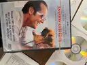 Box of over 100 DVDs (See photos for titles/quantities/photos)