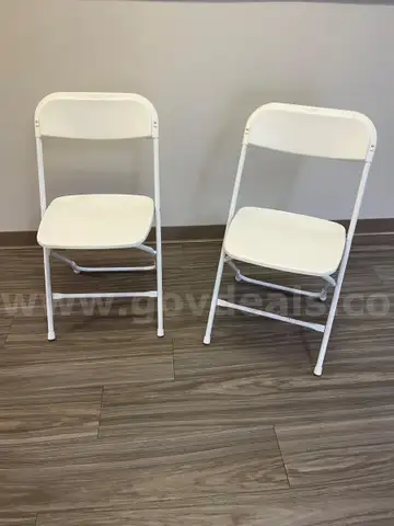 2 White Plastic Folding Chairs - LOCATED AT OUR CARMI, IL CAMPUS