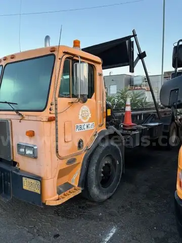 1995 Peterbilt 320 Roll Off Truck