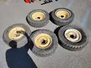 5 wheels and tires from Jeep CJ-7