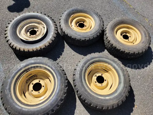 5 wheels and tires from Jeep CJ-7