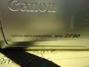 Lot of 9 Canon ZR 80 hand held camcorders.