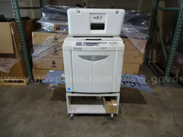Riso EZ 221 U  digital duplicator w/ auto feeder. Comes with spare drum