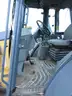 John Deere 410J Backhoe