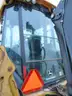 John Deere 410J Backhoe
