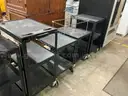Five metal carts