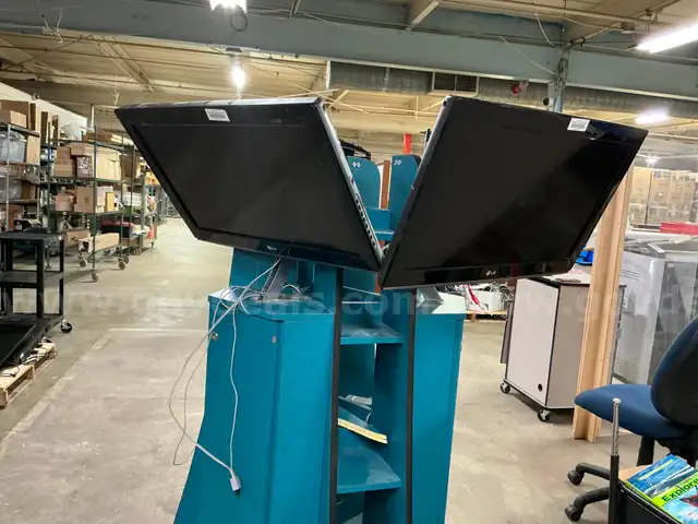 Cart with two LG TVs