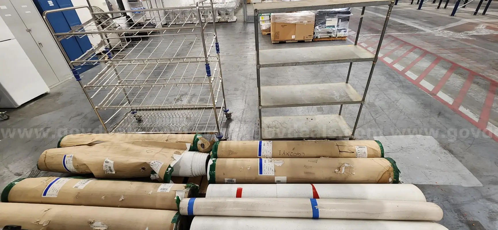 ONE LOT OF LINOLEUM FLOORING WITH TWO CARTS | GovDeals, image size:1731x800
