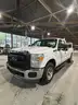 WHITE 2016 Ford F-250 CREW CAB PICKUP TRUCK WITH TOMMY LIFT GATE