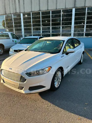 WHITE 2016 Ford Fusion Hybrid 4DR SEDAN