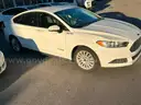 WHITE 2016 Ford Fusion Hybrid 4DR SEDAN