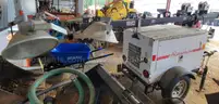 MAGNUM TRAILER MOUNTED PORTABLE LIGHT GENERATOR SET.