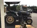 (1) USED 2000 NEW HOLLAND TN65 TRACTOR W/SIDE-ARM MOWER