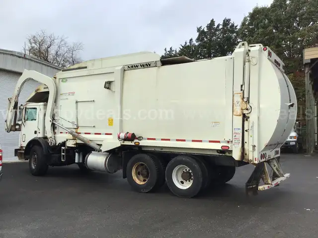 (1) USED 2017 MACK FRONT LOAD GARBAGE TRUCK