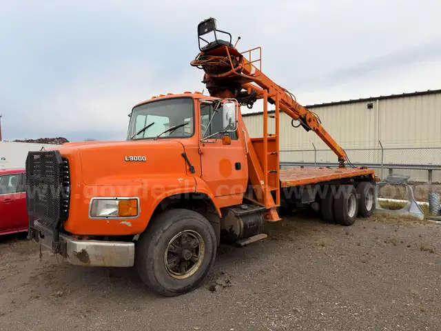 1994 Ford LTS9000 with Grapple Loader