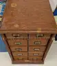 10 drawer antique cabinet, 14" wide x 22.5" Deep x 20" High. <2026JAN19-8>