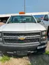 Four (4) Chevrolet Trucks