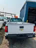 Four (4) Chevrolet Trucks