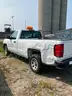 Four (4) Chevrolet Trucks