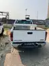 Four (4) Chevrolet Trucks