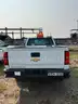 Four (4) Chevrolet Trucks