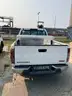 Four (4) Chevrolet Trucks