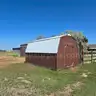 Wooden Shed, 10&#x27; x 16&#x27; w/ Wood Siding &#x26; Metal Roof