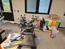 Screenprinting 4-Head Shirt Press