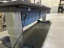 Rising Work Bench on Wheels