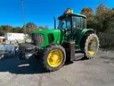 John Deere 6615 Tractor with ALAMO Industrial 60 Inch Rotary Bushhog with 30 foot boom