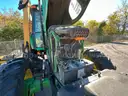 John Deere 6615 Tractor with ALAMO Industrial 60 Inch Rotary Bushhog with 30 foot boom