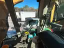 John Deere 6615 Tractor with ALAMO Industrial 60 Inch Rotary Bushhog with 30 foot boom