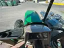 John Deere 6615 Tractor with ALAMO Industrial 60 Inch Rotary Bushhog with 30 foot boom