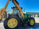 John Deere 6615 Tractor with ALAMO Industrial 60 Inch Rotary Bushhog with 30 foot boom