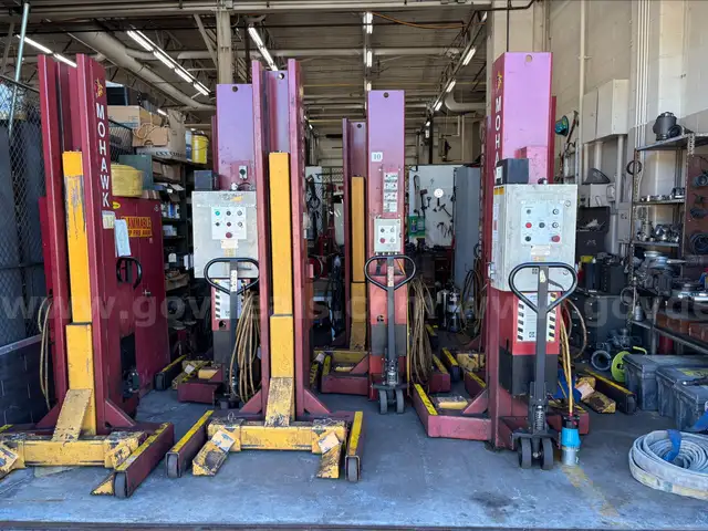 6 motor vehicle lifts 18,000 Lb lifts Mohawk.