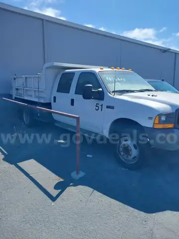 This is an older dump truck with low mileage