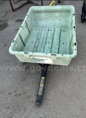 John Deere Tilting/Dumping Wagon Trailer *Tires need air* *Hole on side of wagon*