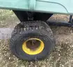 John Deere Tilting/Dumping Wagon Trailer *Tires need air* *Hole on side of wagon*
