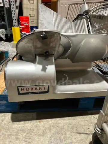 HOBART SLICER AND A MIXER BOWL WITH PADDLE