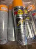 New in box Rust-oleum Striping Machine and 12 yellow striping Paint