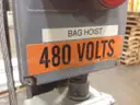 Vibrating hopper with hoist stand