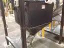 Vibrating hopper with hoist stand
