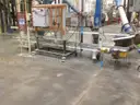 Fischbein Mdl. PILS 300 Inline bag sealer with conveyor