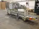 Fischbein Mdl. PILS 300 Inline bag sealer with conveyor